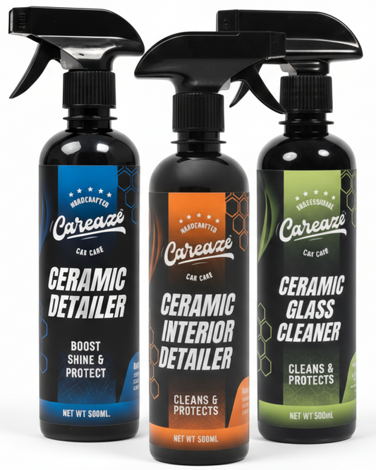 Three spray bottles labeled 'Ceramic Detailer', 'Ceramic Interior Detailer', and 'Ceramic Glass Cleaner' on a black background.